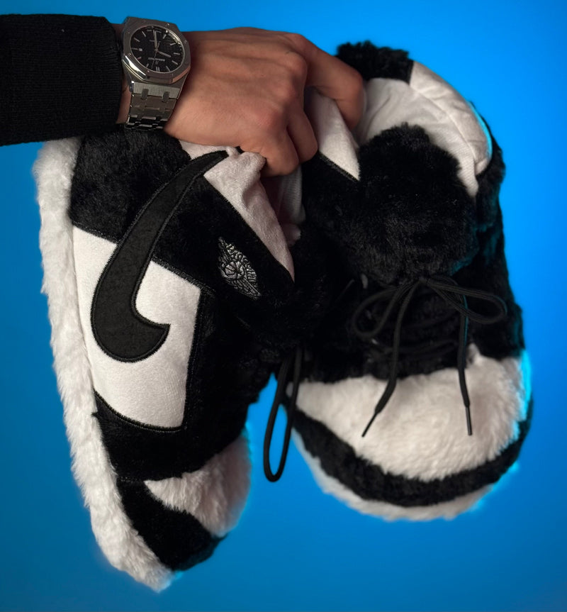 Black and white fuzzy plush slippers with cozy soft lining – warm winter indoor footwear for men, women and teens, ideal for lounging or gifting in Lebanon