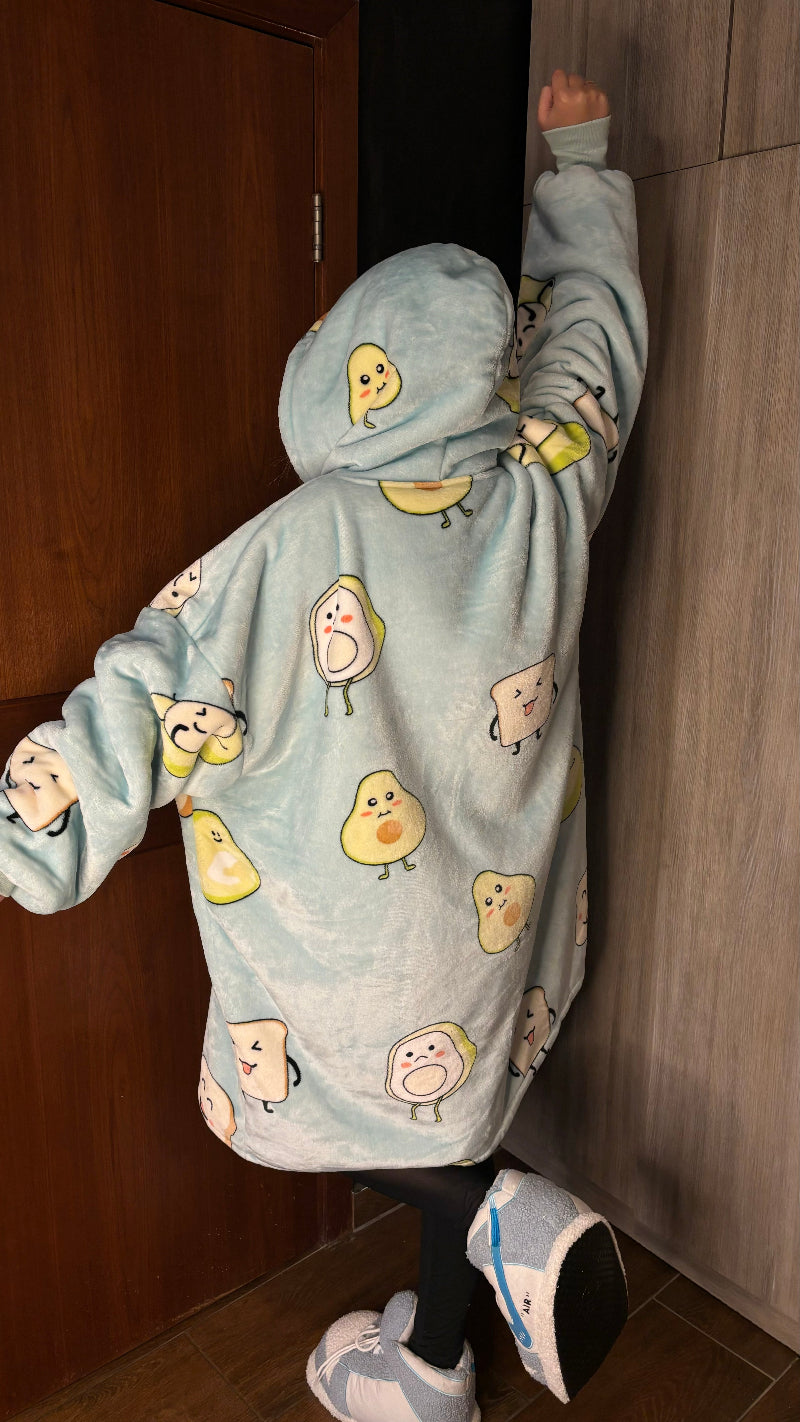 Light blue oversized wearable blanket hoodie with hood and large front pocket – cozy essentials hoodie for men and women, perfect for winter lounging and Christmas gifting in Lebanon